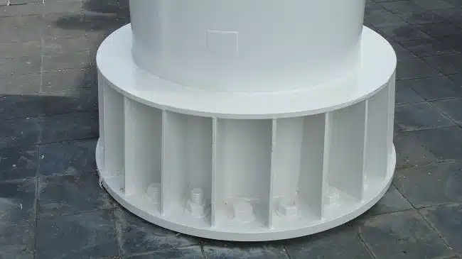 Close-up of the coated steel base and gusset plates of the Auckland Airport flagpole