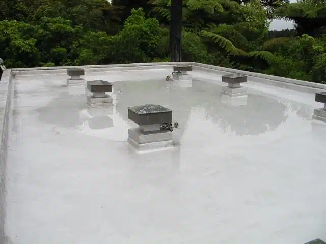 Spark Building Waitakeries flat concrete roof with a seamless waterproof membrane